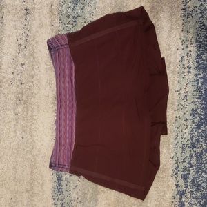 30. Lululemon burgundy Skort with Orange lining
With shorts underneath